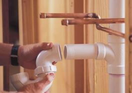 SLC-Plumb-01-263x186 Plumber connecting PVC pipes